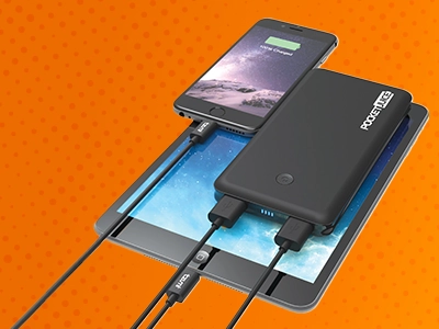 Phone and Tablet plugged into a Portable Charger