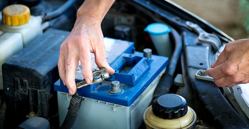 Placing the negative terminal on a battery