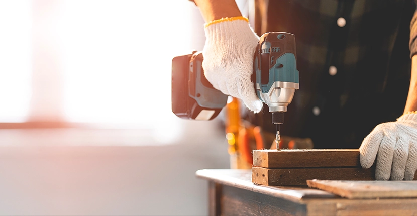Person using a powertool