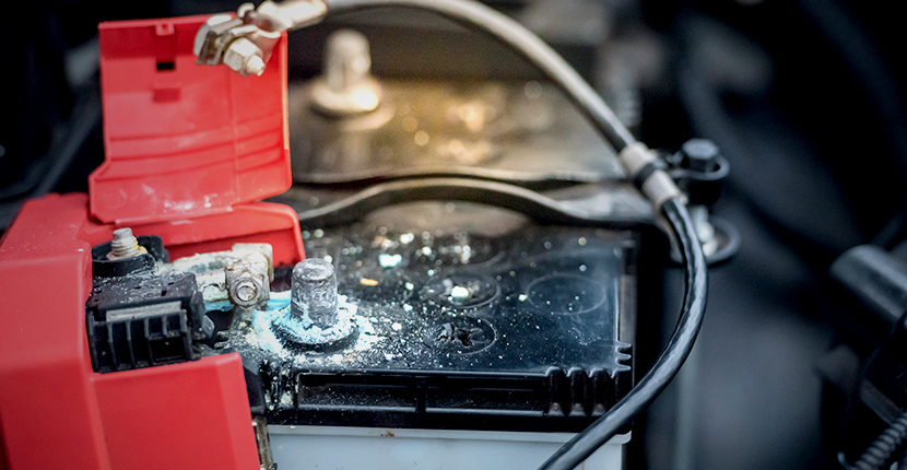 Close up of a corroded battery terminal