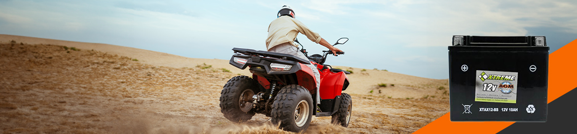 A person driving an ATV in desert, AGM battery hero