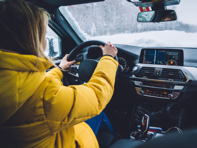 Driving a car while it is snowing