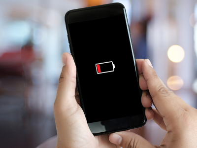 Holding a phone with a dying battery