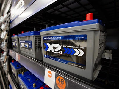 X2Power Auto batteries on the shelf